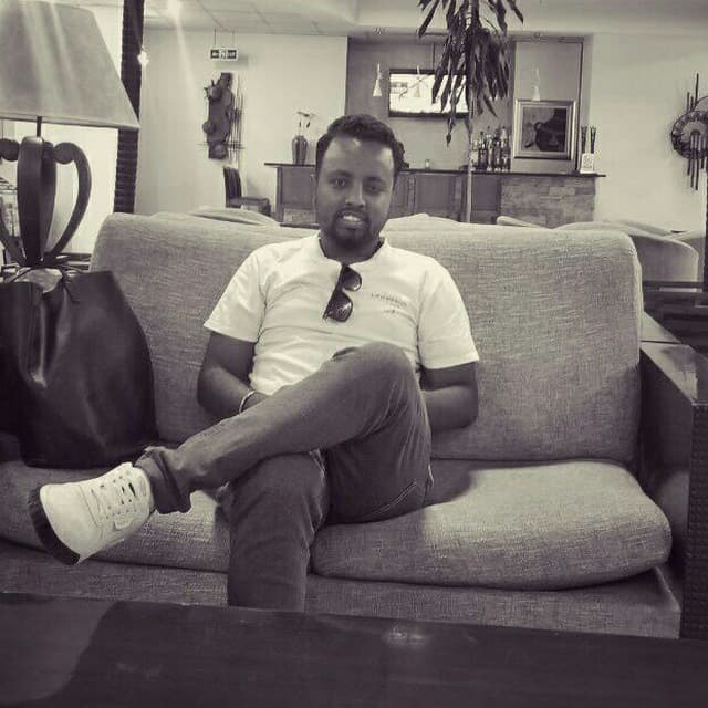 fraol siting on a sofa